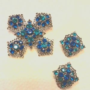 Unsigned demi set clip on earings and brooch.